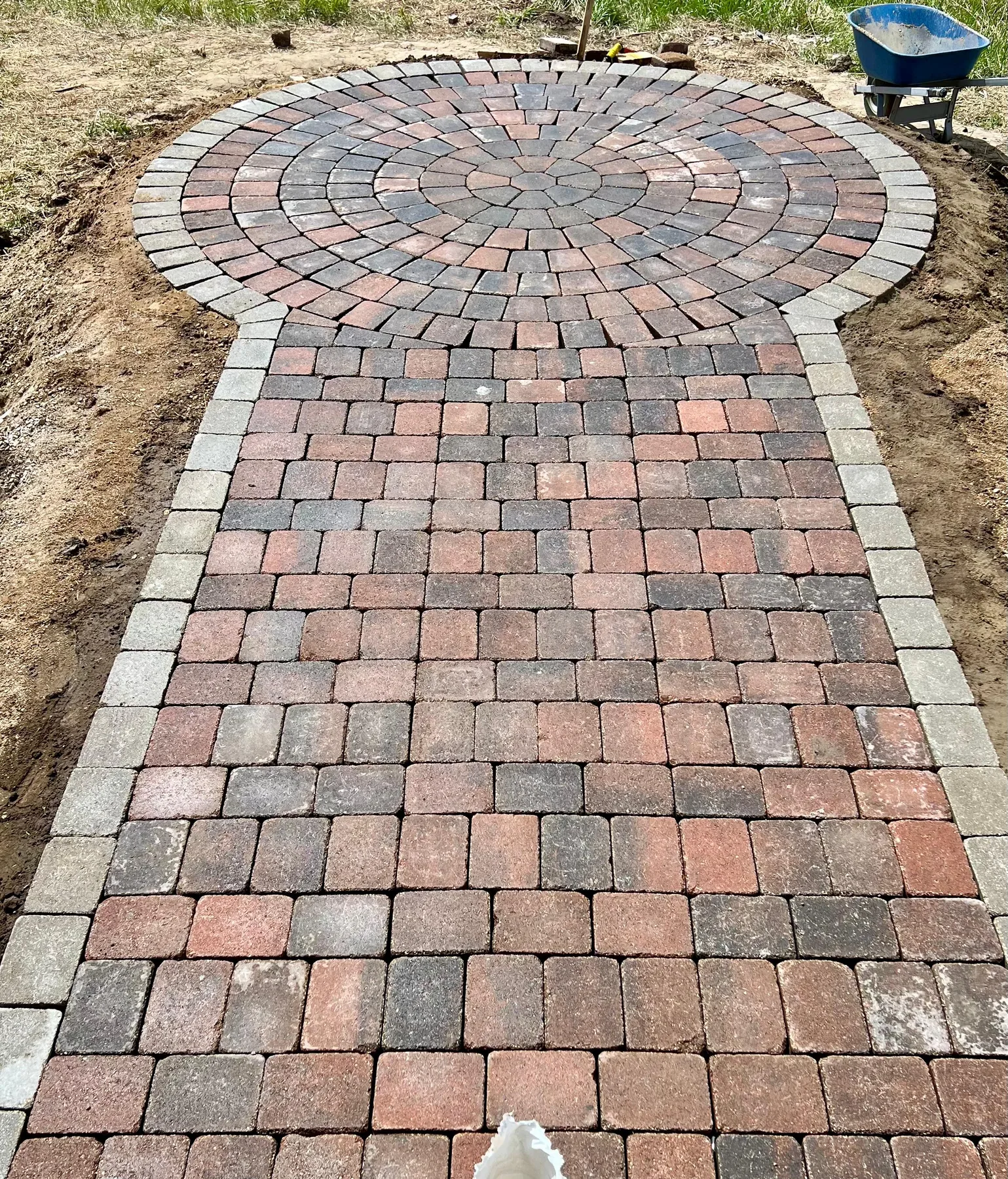 Circular paver patio and walkway installation